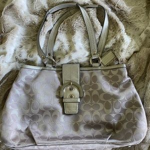 Lightly used grey Coach shoulder bag.